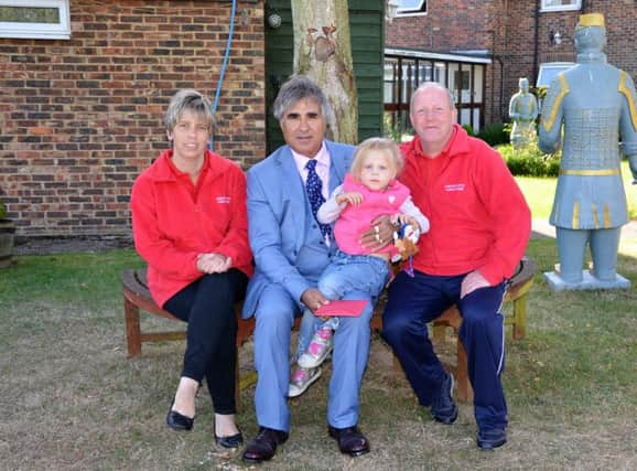 Representatives from the Polegate-based Children with Cancer Fund and Mr Gulzar