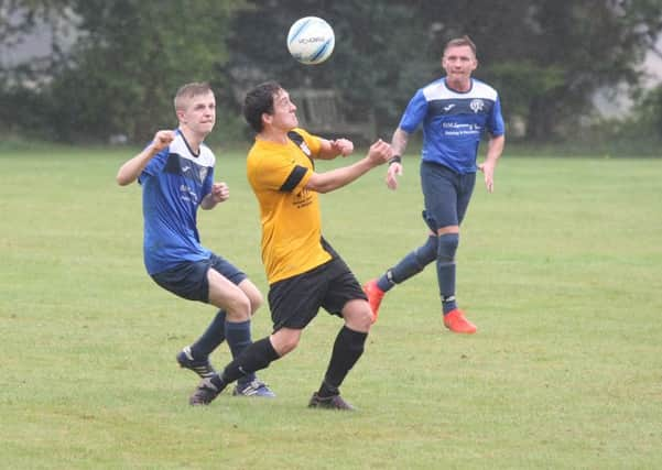 Ryan Stevens (left) thundered Clymping in front at Cowfold on Saturday. Picture: DM16142404