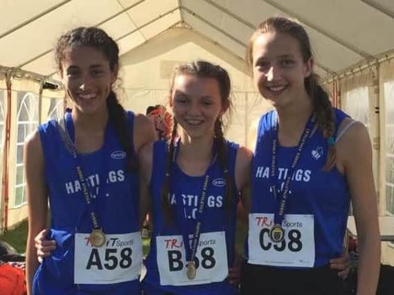 Hastings Athletic Club's under-15 girls proudly display their gold medals. Picture courtesy Terry Skelton