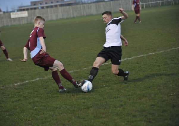 Tom Caplin netted as Lancing picked up a point at Newhaven on Saturday. Picture: Stephen Goodger