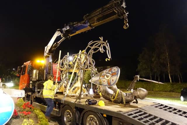 The new 1066 statue is put in place in Battle. Picture by Steve Martin of Tollgates Farmhouse. SUS-161014-102825001