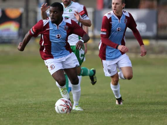 Alex Akrofi, pictured here on the ball against Guernsey on Saturday, is suspended tonight. Picture courtesy Scott White