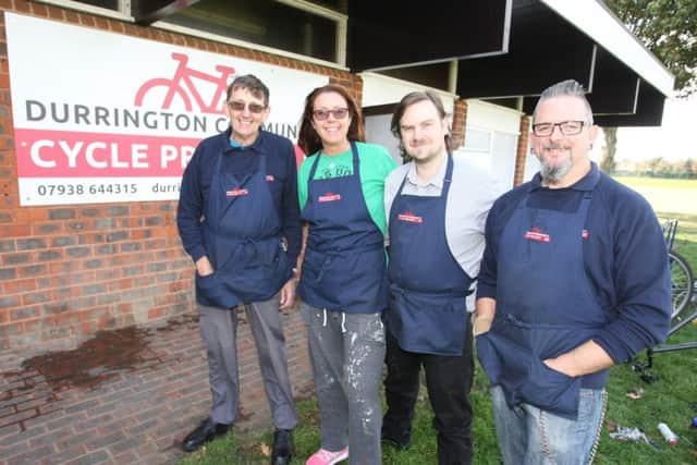 DM16148425a Durrington Community Cycle Project volunteers, from left, Colin Attle, Mandy Buxton, Matthew Shaw and Mark Mann