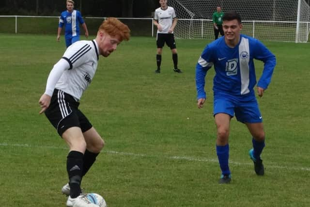 Wayne Giles on the ball for Bexhill United during their 3-1 loss at Storrington last weekend. Picture courtesy Mark Killy