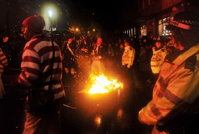 The South Street Bonfire Society procession at the Lewes Bonfire 2015 celebrations this evening
Photograph taken by Simon Dack SUS-160830-123223003