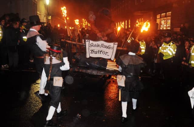 Guy Fawkes is led through the streets at Lewes Bonfire 2015 celebrations this evening Photograph taken by Simon Dack