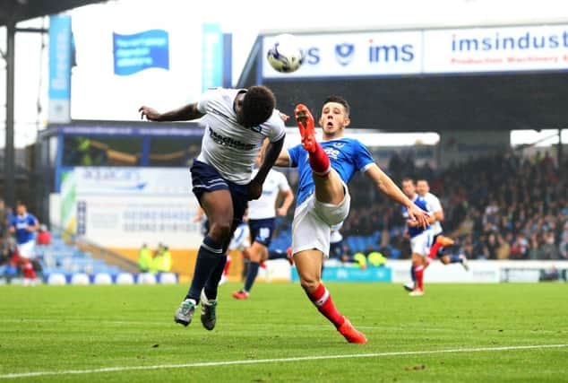 Conor Chaplin flicks the ball over Anthony Stewart on his way to netting his Pompey wonder goal. Picture: Joe Pepler