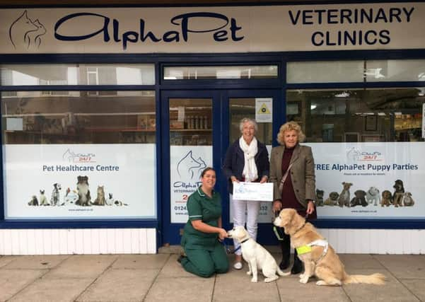 Charlie Sampson with Guide Dogs representatives