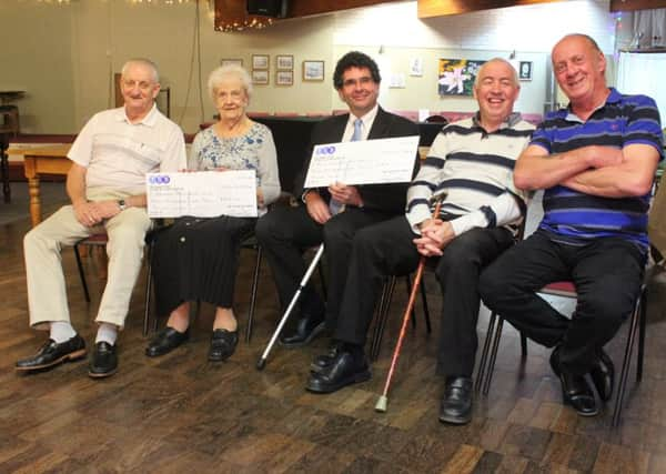 Les Lozone and Dennis Wickens have raised Â£10,000 for charity by doing 24 hour fishing trips. Pictured with Dennie's mum, Justine, Terry and Dennis Wickens
Picture by Cheryl Bryant-Owens