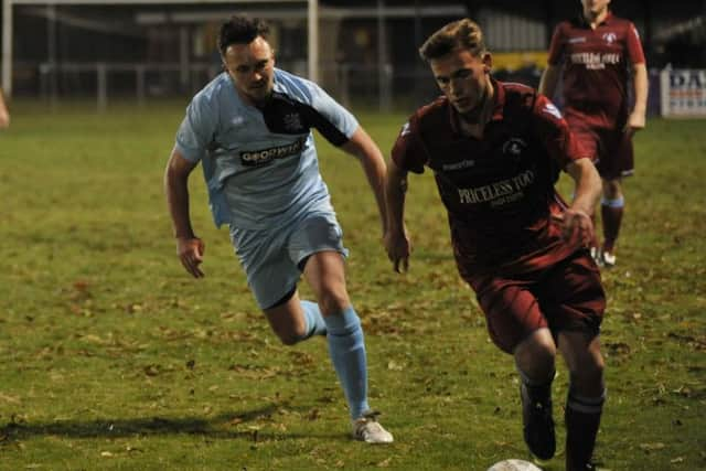 Little Common midfielder Harry Saville on the charge. Picture by Simon Newstead