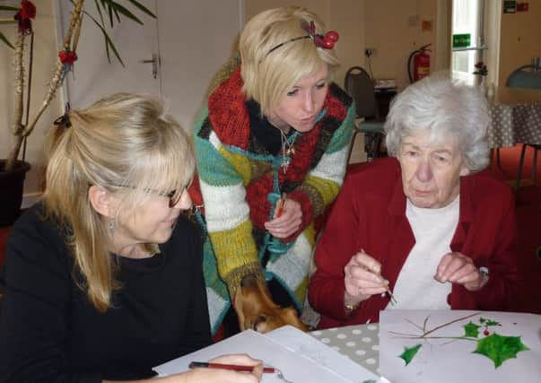 From left: Catherine Vandersteen, artist Kathy Plank and Catherine's mother Ena Harris