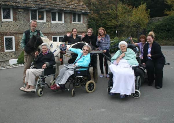 Three residents took turns up and down the car park at Valerie Manor and thoroughly enjoyed themselves on the pony and trap ride