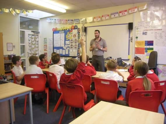 Author David Fuller inspires pupils with his football-themed masterclass