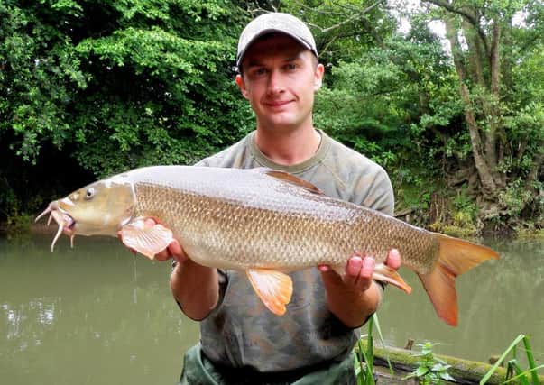 P&B club angler Stephen Gray with a 12lb 3oz barbel