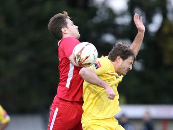 Frannie Collin challenges for an aerial ball during Hastings United's 7-0 win away to Chatham Town on Saturday. Picture courtesy Scott White