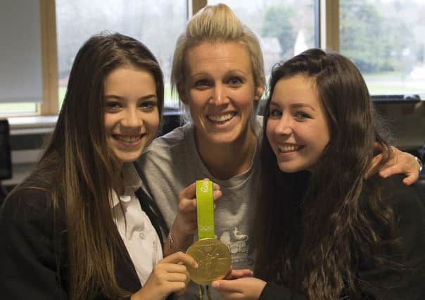 Alex is pictured with students Lauren Ferris and Izzy Gregory