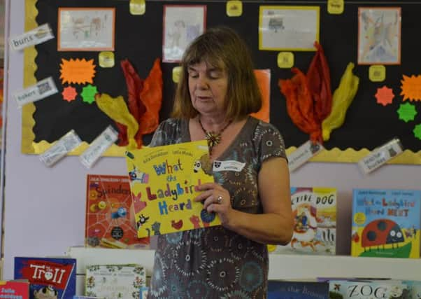 Julia reading from What The Ladybird Heard