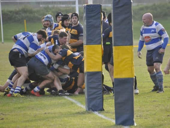 Hastings & Bexhill defend their tryline against Old Williamsonians last weekend. Picture courtesy Nigel Baker