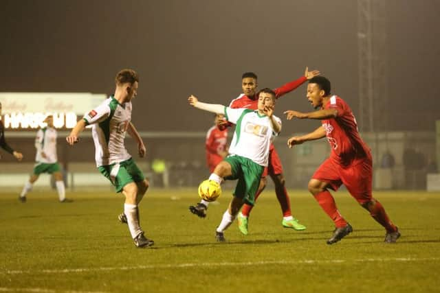 Ollie Pearce shoots for goal in the win over Harrow / Picture by Tim Hale