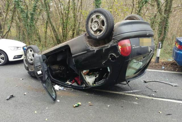 A car has overturned in Titnore Lane, Worthing. Picture: Eddie Mitchell