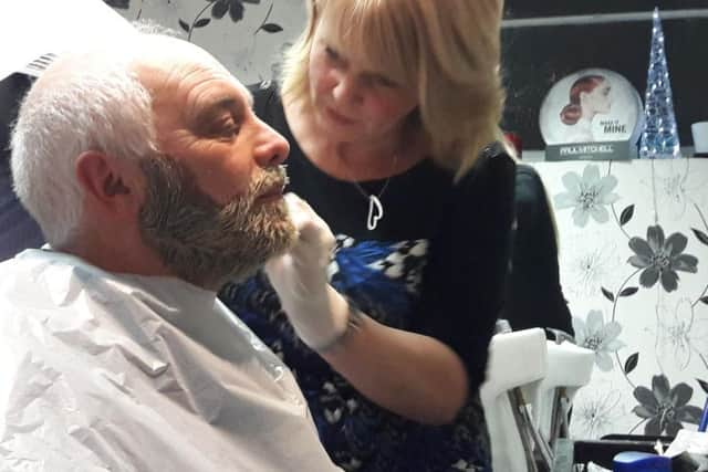 Council leader David Tutt had his beard dyed for charity