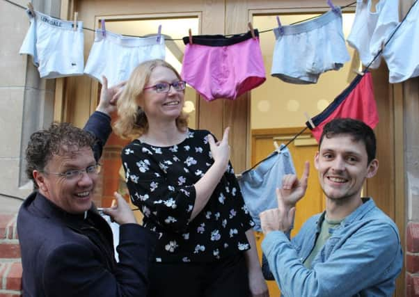 Revd Dr Andy Angel (left), Ginny Nicholls, parish administrator and Nathan Ghinn from the youth work team