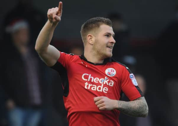 Crawley Town's James Collins scores against Newport County (Photo by Jon Rigby) SUS-161217-180547002