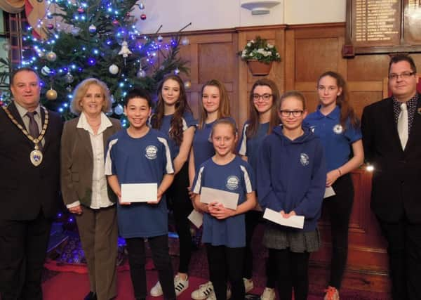 (Left to right): Littlehampton mayor Ian Buckland, Daphne Belt, Daniel Fernandes, Madison Walker, Amber Brown, Ella Thornburg, Jessica Brown, Marissa Netherwood, Beth Kincaid and councillor Billy Blanchard-Cooper