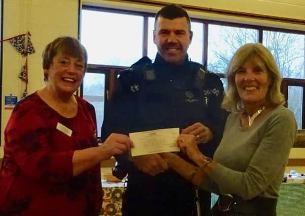 (L-R) Pett Older People's Project coordinator Sheila Thomas, Sgt Dave Townsend and POPP chairman Ann Nicholls SUS-161221-135434001