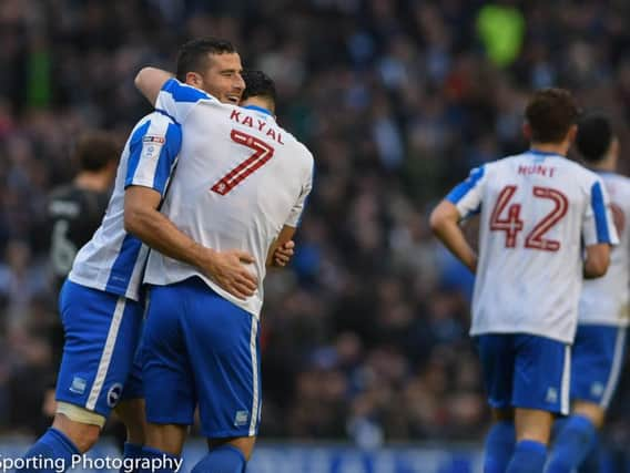 Albion players celebrate the first goal in their win against MK Dons. Picture by Phil Westlake (PW Sporting Photography)