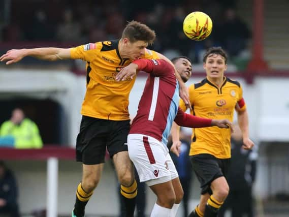 Hastings United forward Jack Harris in the thick of the action during Saturday's 2-1 defeat at home to Cray Wanderers. Picture courtesy Scott White