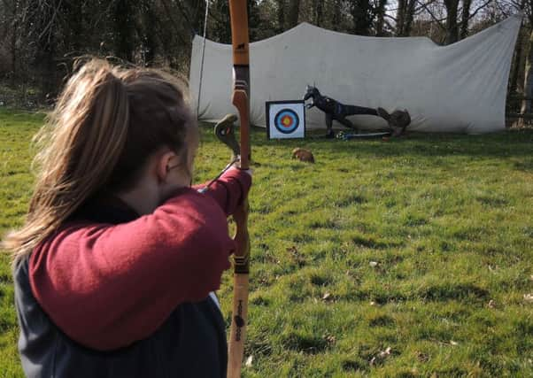 Shooting a 'beastie' at an ACA 3D archery event SUS-170116-141109001