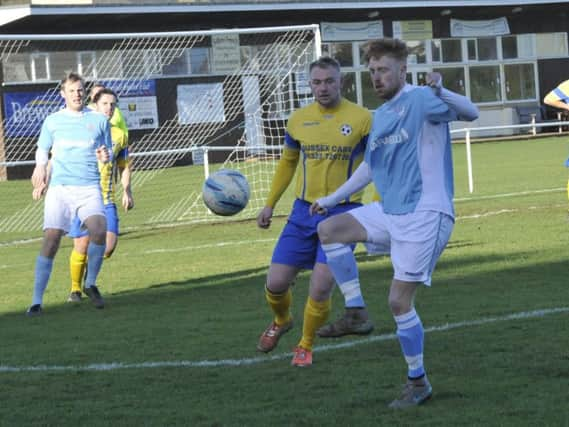 Action from Bexhill United's most recent home game against Langney Wanderers. Picture by Simon Newstead