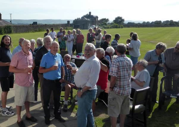 Sport supporters in Petworth Park