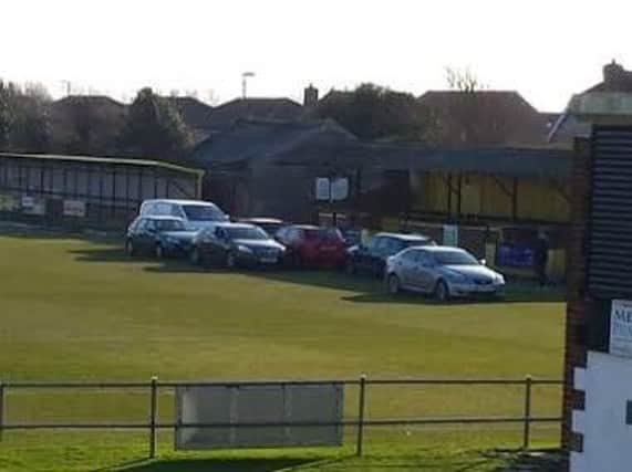 Cars gather on The Sportsfield pitch to try and thaw out freezing areas.