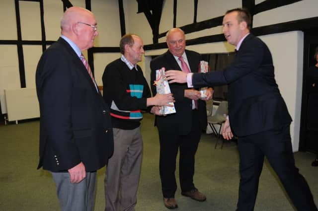 John Backshall, David Tunks and Clive Penny receive their award from Mark Purves at the annual awards evening  PICTURE BY STEVE MORLEY