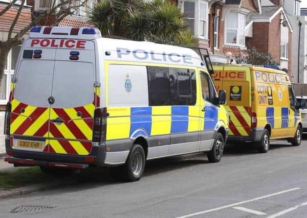 Police outside an address in Aldwick Road, Bognor Regis, in April last year. Picture Eddie Mitchell