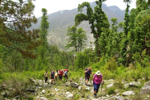 Trekkers climbing the Himalayas