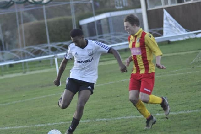 Johnny Akoto prepares to clip the ball down the line.