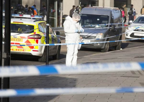 Officers at the scene on Friday. Picture by Eddie Mitchell