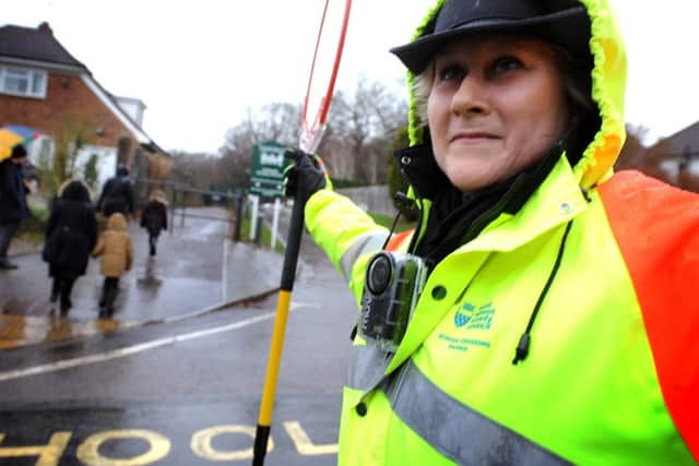 Harlands School in Haywards Heath trial recording devices for crossings outside the school. Bev Morley with the camera at work outside the school. Pic Steve Robards SR1700406 SUS-170114-123741001