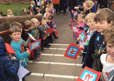 Key stage one children greeted the trekkers on their return to school