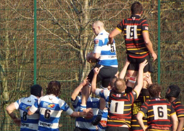 Hastings & Bexhill second rower Dom Sewell gathers the ball at a lineout. Pictures courtesy Peter Knight