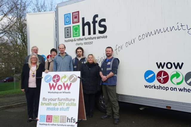 Hastings Mayor Judy Rogers with HFS staff and visitors alongside the Workshop on Wheels SUS-170221-112324001