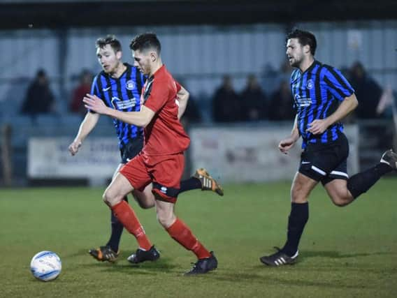 Action from Shoreham's defeat at Hassocks last night. Picture by Phil Westlake (PW Sporting Photography)