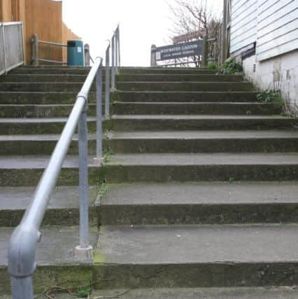 The steps leading to the footbridge