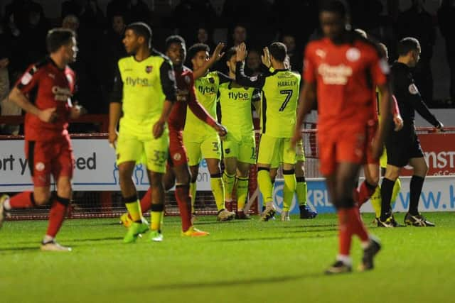 Exeter City players celebrate their second goal.

Picture by Jon Rigby