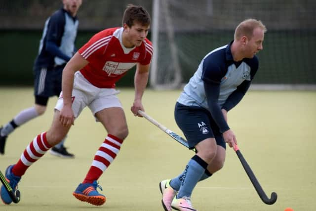 Andrew Acott on the ball for Saxons.