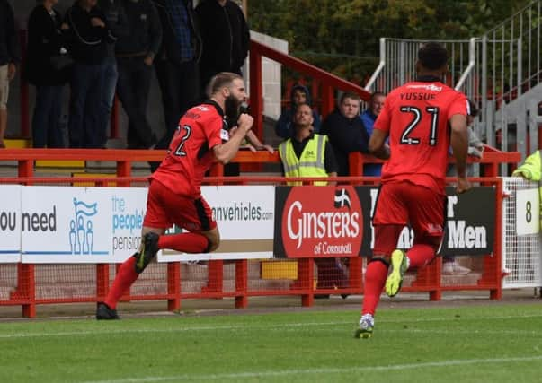 Joe McNerney celebrates a goal earlier this season.