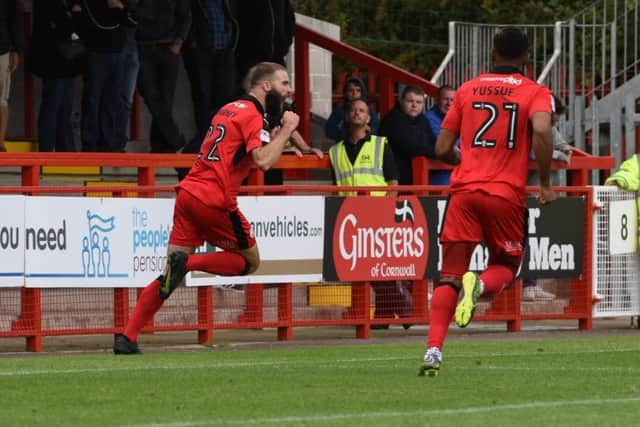 Joe McNerney celebrates a goal earlier this season.